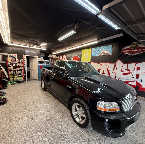 Restored Ford F150 lightning collision repair with paint match refinish